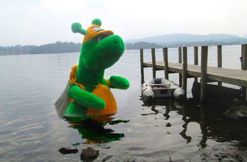 Bownessie mascot in the water at Lake Windermere